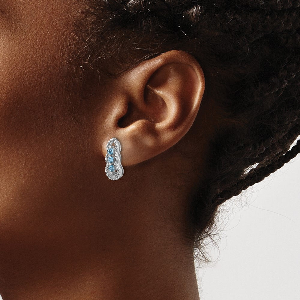 QE17759BT Sterling Silver Rhodium-plated Light Swiss Blue Topaz Post Earrings