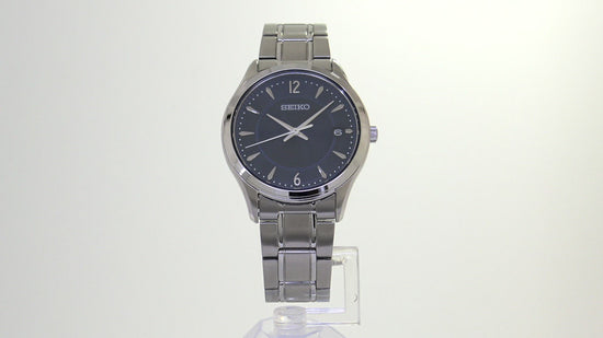 Load and play video in Gallery viewer, Seiko Noble Quartz Blue Dial Stainless Steel Men&amp;#39;s Watch SUR419
